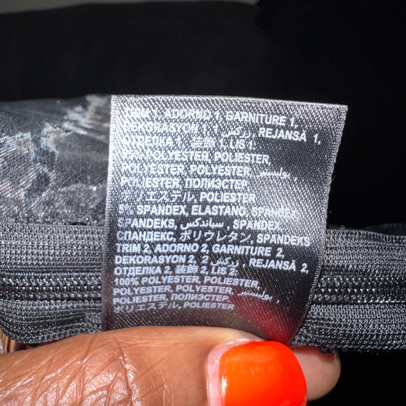 Beautiful black sequined blouse can be paired with a skirt or denim jeans. Bebe - Picture 5 of 6